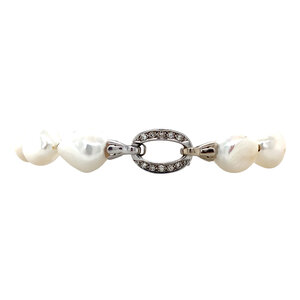 Pearl bracelet with white gold diamond clasp 14 krt