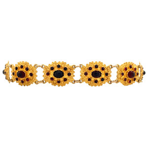 Gold bracelet with garnet 14 krt