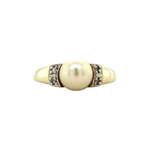 Gold ring with pearl and diamonds 14 krt