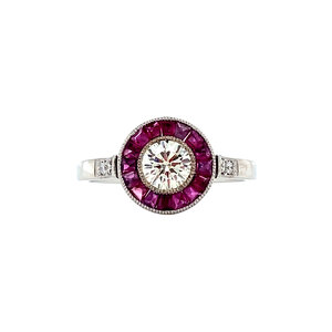 White gold ring with ruby and diamonds 14 krt