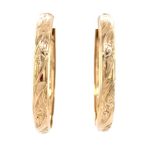 Gouden fantasie oorringen 18 krt