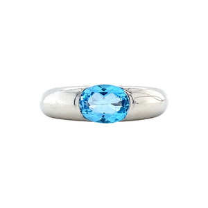 White gold ring with topaz 14 kt
