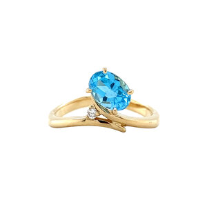 Gold ring with topaz and diamonds 18 krt