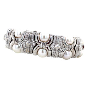 White gold bangle with pearl and diamond 18 krt