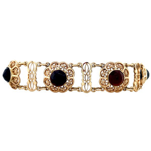 Gold bracelet with garnet 14 krt