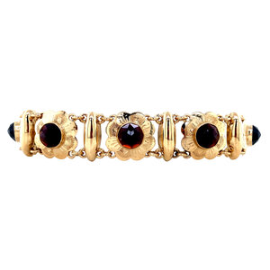 Gold bracelet with garnet 14 krt
