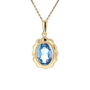 Gold pendant with blue spinel 14 krt
