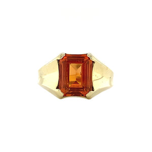 Gouden pinkring met oranje saffier  14 krt