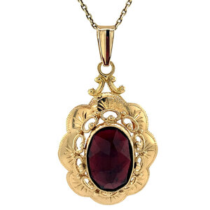 Gold pendant with garnet 14 kt