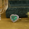 vintage White gold entourage ring with emerald and diamond 18 kt
