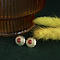 vintage Gouden oorstekers met bloedkoraal 14 krt