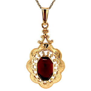 Gold pendant with garnet 14 kt