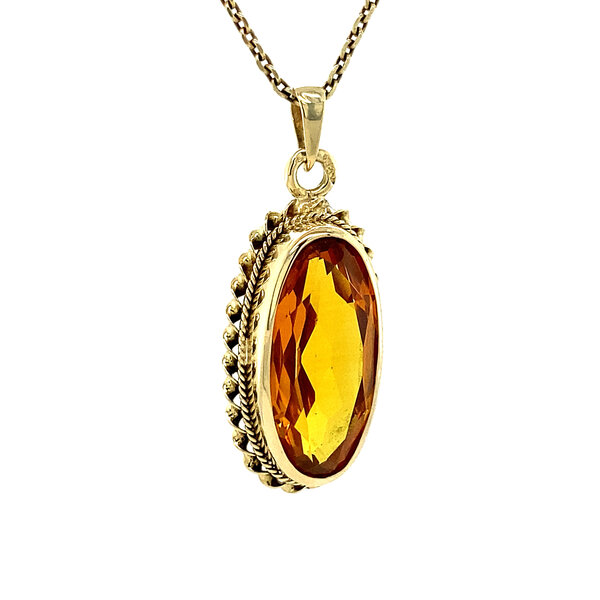 vintage Gold pendant with orange sapphire 14 krt