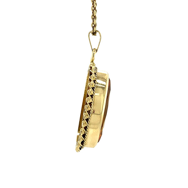 vintage Gold pendant with orange sapphire 14 krt