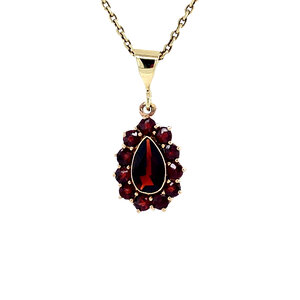 Gold pendant with garnet 14 krt