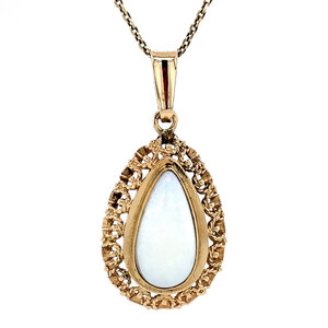 Gold pendant with opal 14 krt