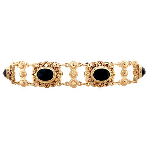 Gold bracelet with garnet 14 krt