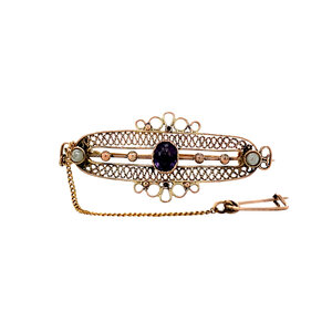 Gold brooch with coloured stone and pearl 14 krt