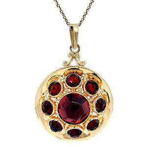 Gold pendant with garnet 14 krt