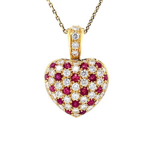 Gold heart pendant with ruby and diamonds 18 krt