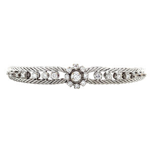 White gold bracelet with diamonds 18 krt