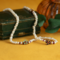 vintage Vintage pearl necklace with ruby and enamel 14 krt