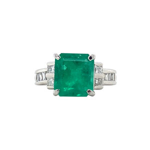 Platinum ring with emerald and diamond 850
