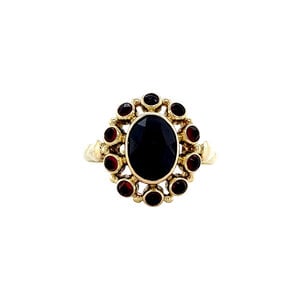 Gouden ring met granaat 14 krt