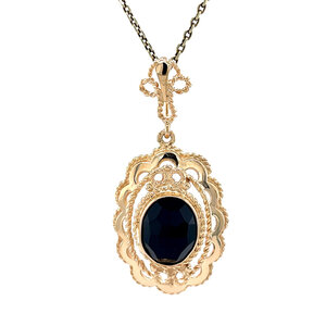 Gold pendant with garnet 14 krt