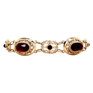 Gold boats bracelet with garnet 14 krt