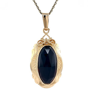 Gold pendant with garnet 14 kt