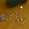 vintage Gouden vintage letter O hanger met diamant 14 krt