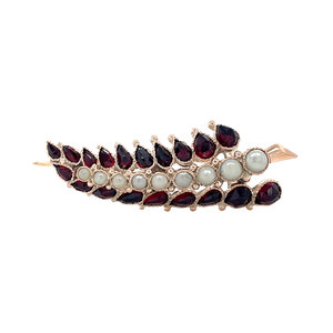 Gouden broche met granaat en parel 14 krt