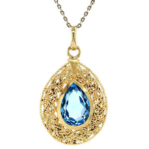 Gold pendant with blue gemstone 18 ct