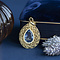 vintage Vintage gouden hanger met blauwe kleursteen 18 krt