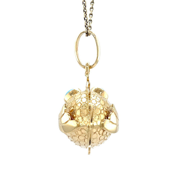 vintage Gold vintage fish pendant with colored stone 18 kt