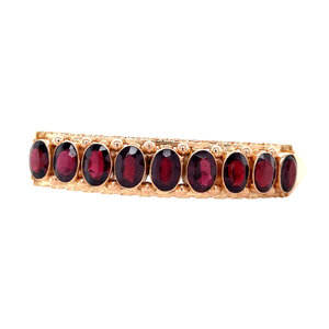 Rose gold bangle with garnet 14 ct
