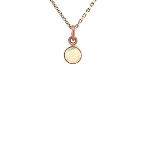 Rose gold pendant with opal 14 carat