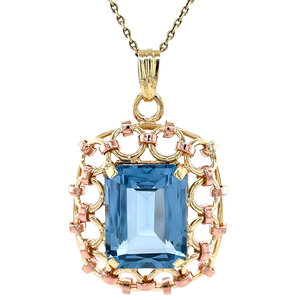 Golden pendant with spinel 14 kt