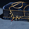 vintage Gouden vintage collier met robijn en diamant 18 krt