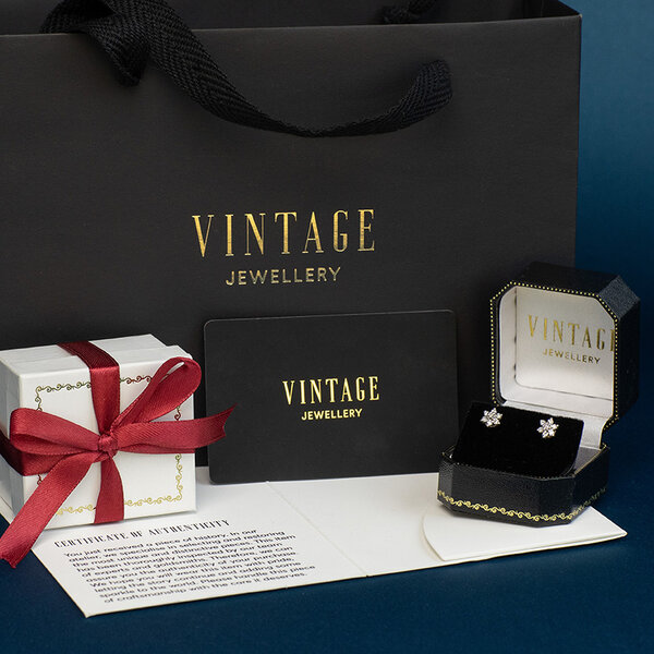 vintage Witgouden vintage oorstekers met saffier en diamant 14 krt