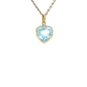 Golden heart pendant with topaz 18 kt