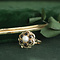 vintage Gouden vintage entourage ring met parel en granaat 14 krt