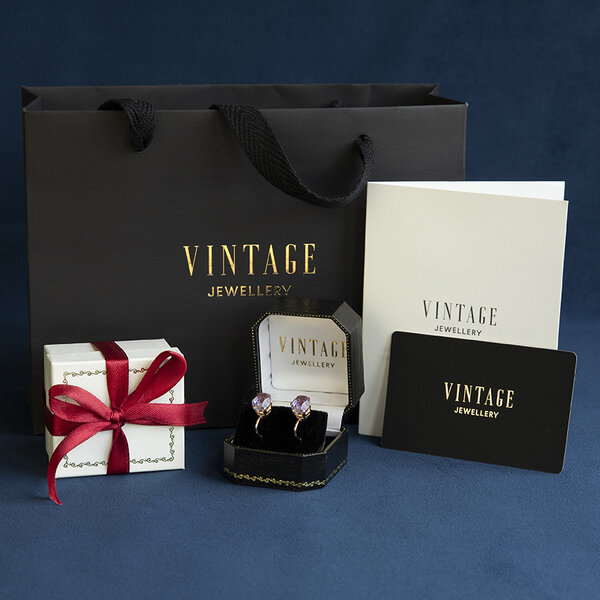 vintage Gouden vintage oorstekers met saffier en diamant 14 krt