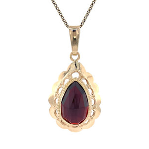 Gold pendant with garnet 14 kt