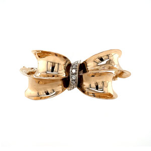 Golden bow brooch with diamond 14 kt