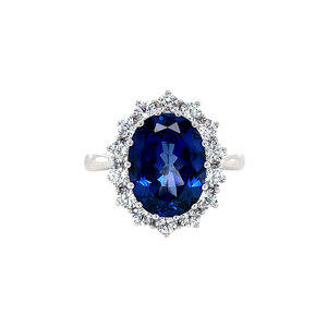 White gold ring with sapphire and zirconia 14 kt