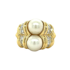 Geelgouden ring met parel en diamant 18 krt