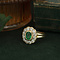 vintage Gouden vintage entourage ring met smaragd en diamant 18 krt