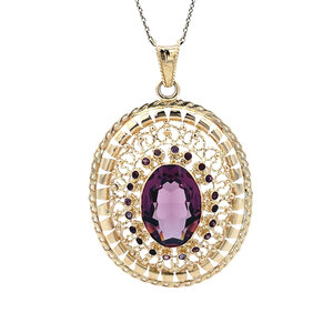 Gold pendant with colored stone 14 kt